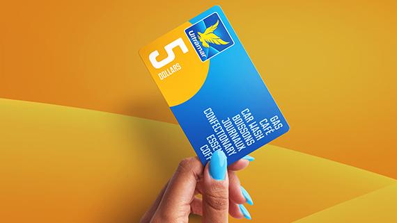 Hand with blue fingernails holding up and Ultramar gift card.